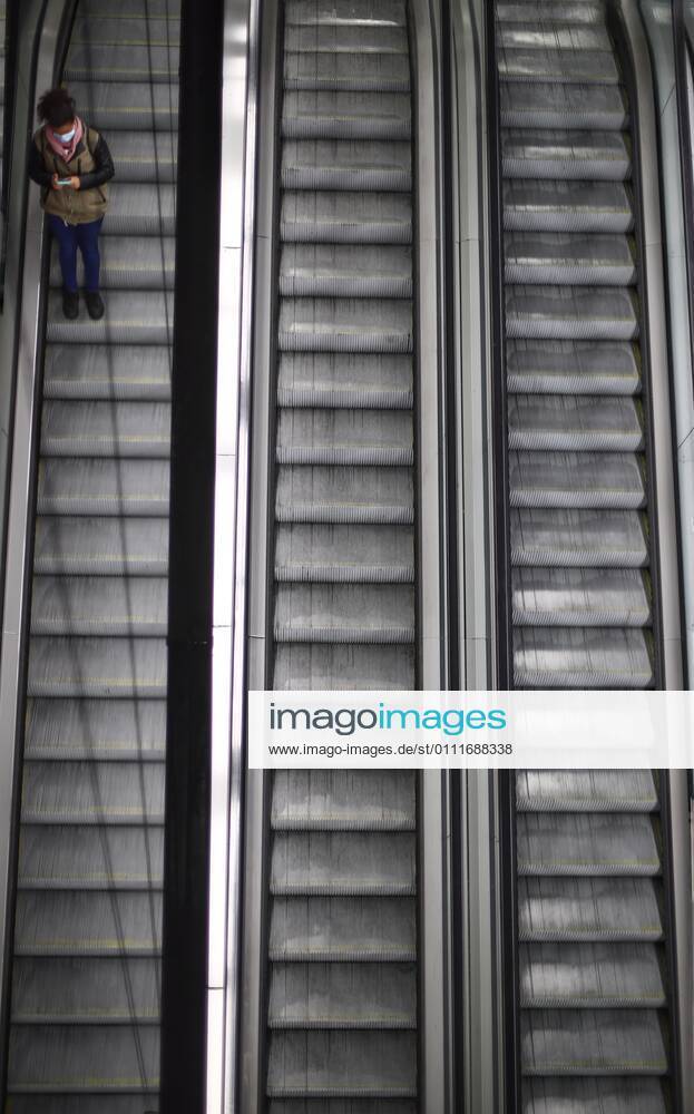 A passenger descends the stairs of the metro at Sol station on the same day that new restrictions come into force in the region by the Covid-19, in Madrid, (Spain), on February 1, 2021. As of today in Madrid, 19 more basic health zones (ZBS) have been extended to have restrictions, from which it is not possible to enter or leave without a justified cause such as work or studies. These 19 are in addition to those already restricted previously, which is why at the moment there are a total of 71 basic health zones (ZBS) and 30 localities with restrictions in the region. 01 FEBRUARY 2021;RESTRICTIONS;MADRID;COVID19;METRO;RENFE;TRANSPORT ZBS Eduardo Parra LagenciaEP 02 01 2021 Madrid Madrid Spain