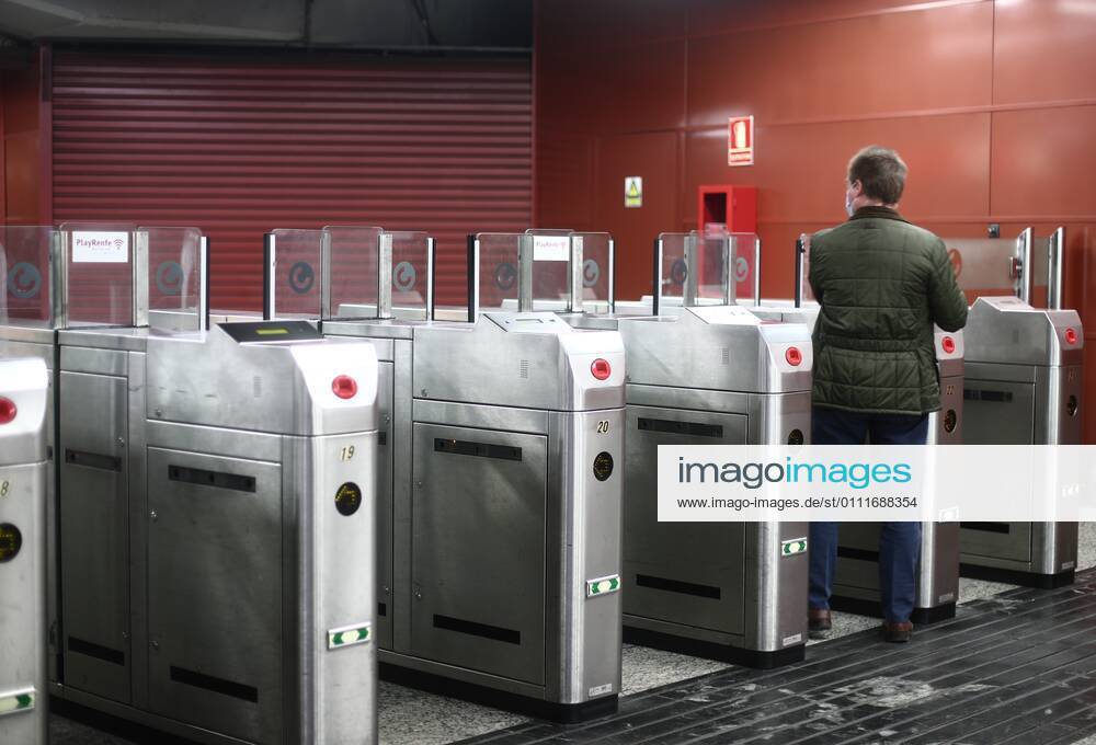 A passenger crosses the Renfe turnstiles at Sol station on the same day that new restrictions come into force in the region by Covid-19, in Madrid, (Spain), on February 1, 2021. From today in Madrid, 19 more Basic Health Zones (ZBS) are extended to those with restrictions, from which you can not enter or leave without good cause such as work or studies. These 19 are in addition to those already restricted previously, which is why at the moment there are a total of 71 basic health zones (ZBS) and 30 localities with restrictions in the region. 01 FEBRUARY 2021;RESTRICTIONS;MADRID;COVID19;METRO;RENFE;TRANSPORT ZBS Eduardo Parra LagenciaEP 02 01 2021 Madrid Madrid Spain