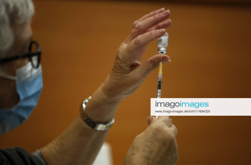 (210201) -- TEL AVIV, Feb. 1, 2021 -- A medical worker prepares the COVID-19 vaccine at a health service center in Tel Aviv, Israel, on Feb. 1, 2021. Israel s Ministry of Health reported 8,399 new COVID-19 cases on Monday, bringing the tally in the country to 651,405. The number of people vaccinated against the COVID-19 in Israel has surpassed 3.14 million, or 33.8 percent of its total population, since the vaccination campaign began on Dec. 20, 2020. (Photo by Xinhua) ISRAEL-TEL AVIV-COVID-19-VACCINATION GilxCohenxMagen
