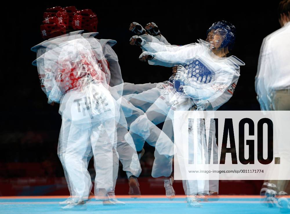 OLYMPIA - Olympische Spiele 2012 LONDON,ENGLAND,08.AUG.12 - DIVERS, OLYMPIA, KAMPFSPORT, TAEKWONDO - Olympische Sommerspiele in London 2012, bis 49kg, Damen. Bild zeigt ein Feature mit Chen-Yang Wei (TPE) und Alexey Denisenko (RUS).