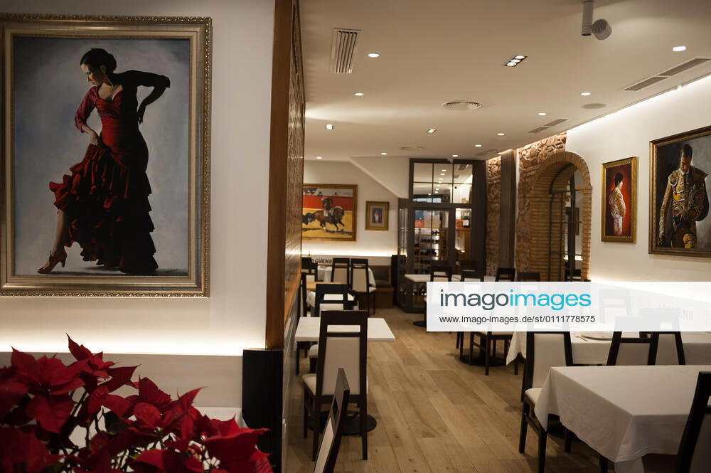 An empty Lo gueno restaurant is seen decorated with paintings of flamenco and bullfighters during the closure of the hospitality sector and non-essential activities as part of a partial lockdown..For two weeks, besides the limit on mobility between cities, many municipalities and Costa del Sol districts (including the Malaga capital) will have to close bars, restaurants and stores as measures to curb the spread of the coronavirus pandemic. In the lead of Andalusia, Malaga is the city with more daily coronavirus infections and a high rate of hospitalizations. Malaga Spain - ZUMAs197 20210202_zab_s197_016
