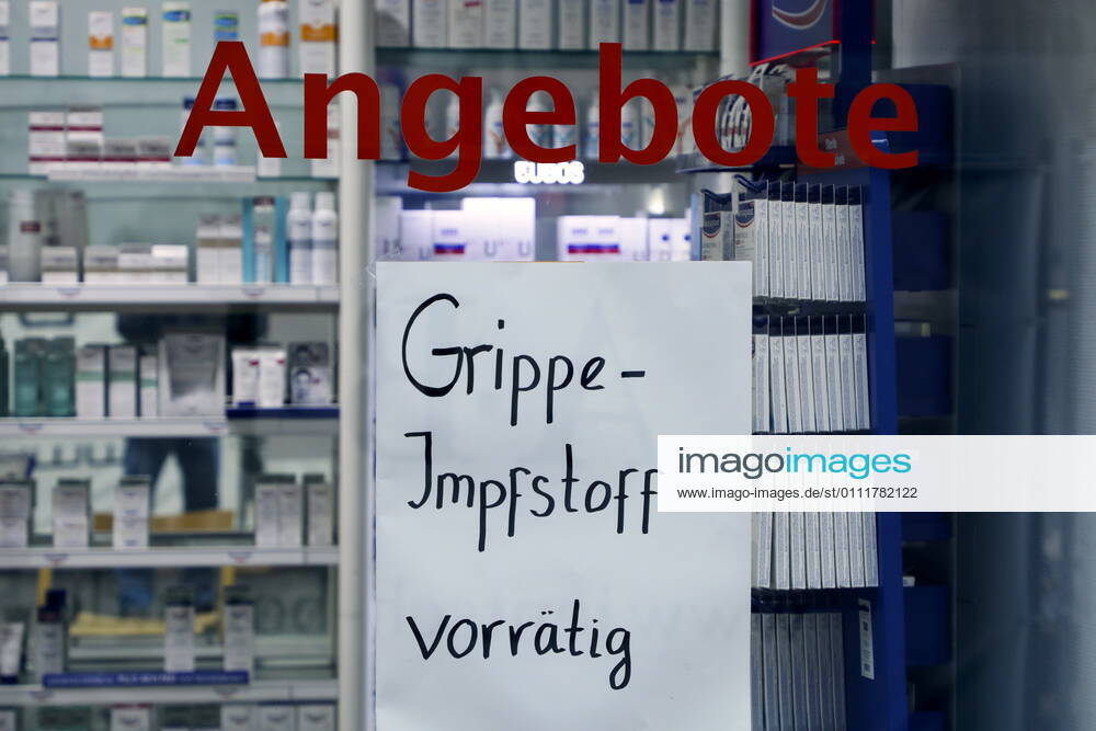 Bonn, Germany Corona crisis photo flu vaccine available notice at a pharmacy