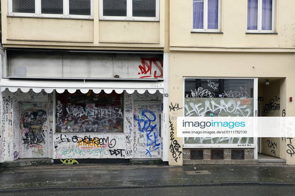 Bonn, Germany Photo Graffiti-covered facades and shop windows in Bonn city centre