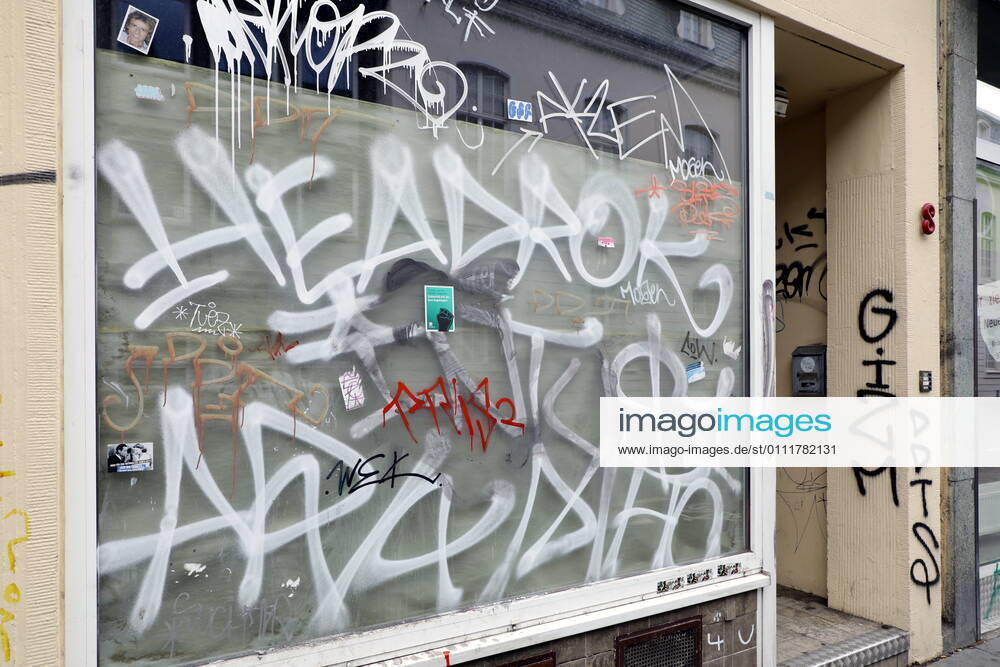 Bonn, Germany Photo Graffiti-covered facades and shop windows in Bonn city centre