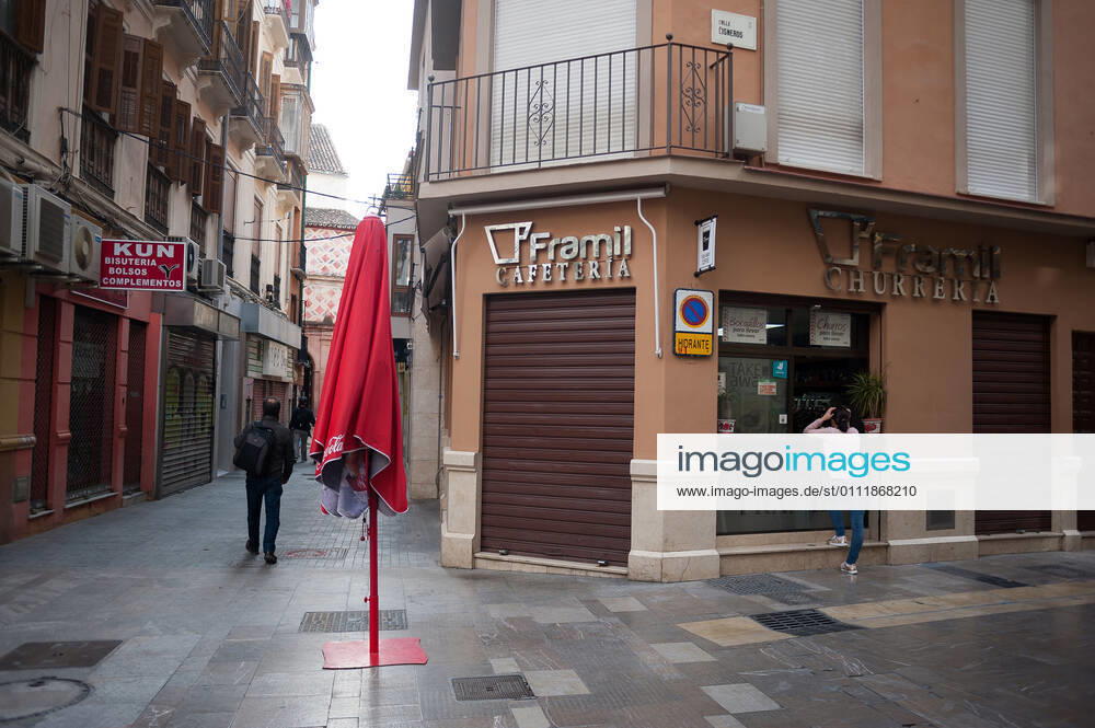 A woman seen at a coffee take away shop outside in Malaga amid partial lockdown caused by coronavirus pandemic. Malaga Spain - ZUMAs197 20210203_zab_s197_009