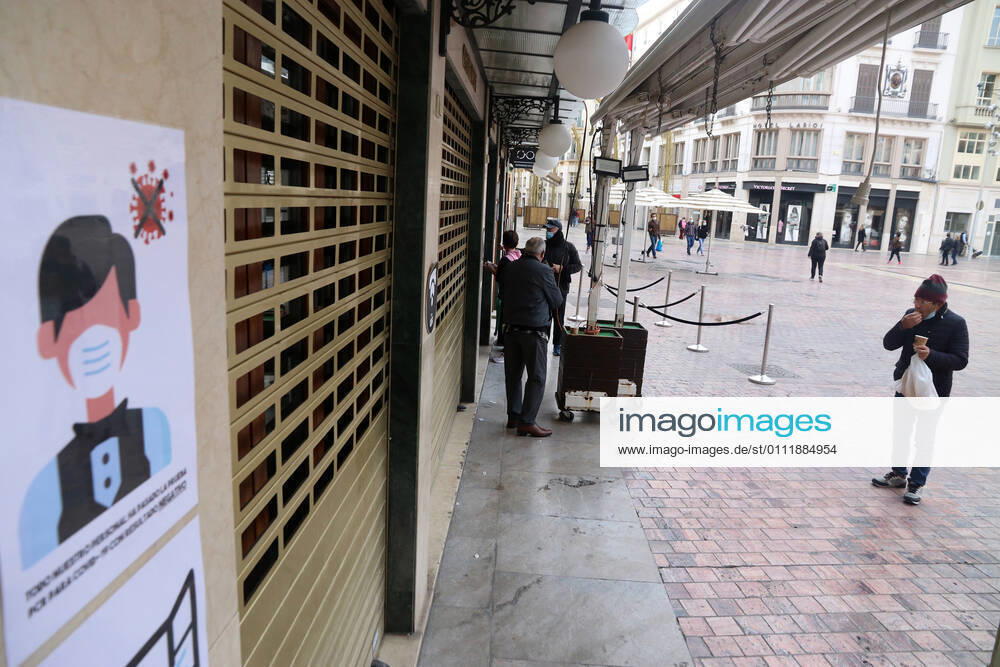 Cessation of all non-essential activity in Malaga capital due to the rate of a thousand infections that exceeded in the last 14 days, from today both the hostelerias as any activity marked as non-essential close their doors for the next two weeks, in the image several people collect takeaway food from some bars that offer this service. Malaga on February 03, 2021 03 FEBRUARY 2021 Ãlex Zea LagenciaEP 02 03 2021 Malaga (Andalusia) Malaga (Andalusia) Spain