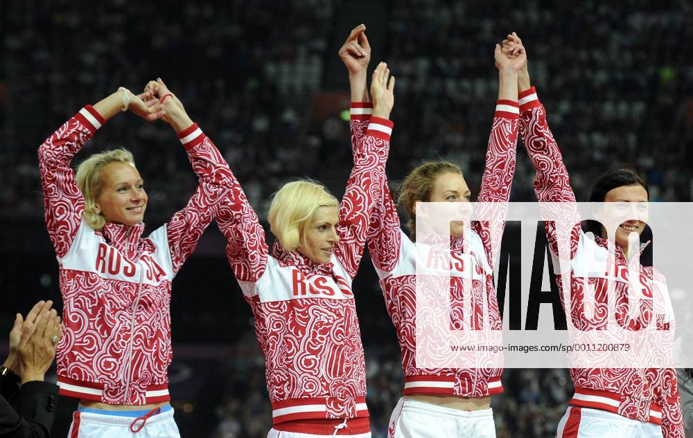 Silver medalists Russia s Yulia Gushchina, Antonina Krivoshapka, Tatyana Firova and Natalya Antyukh (L-R) pose on the podium during the medal ceremony for the Women s 4x400m Staffel Relay at the London 2012 Olympic Games. RE105AE6