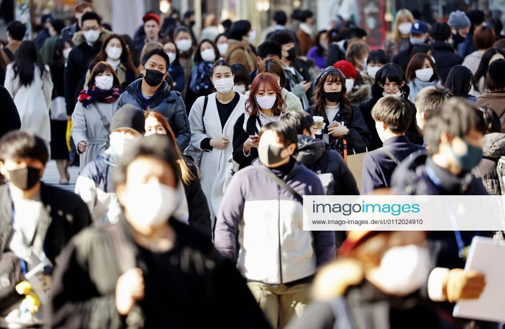 Coronavirus cases top 400,000 in Japan People wearing face masks to protect against the novel coronavirus walk in Tokyo s Shibuya area on Feb. 5, 2021. The cumulative number of coronavirus cases in Japan exceeded 400,000 the same day.