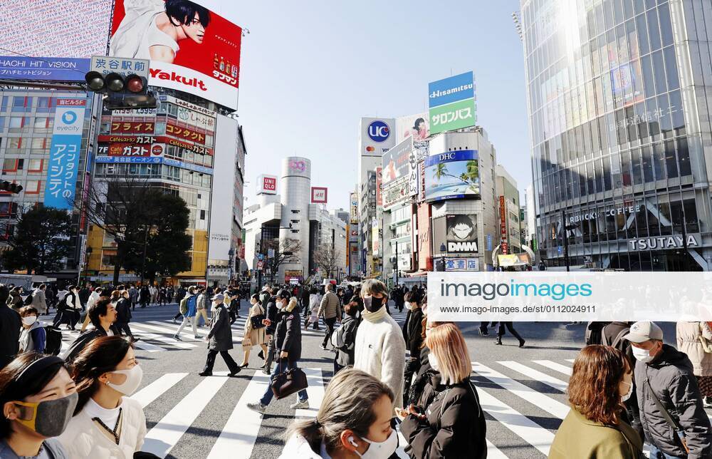 Coronavirus cases top 400,000 in Japan People wearing face masks to protect against the novel coronavirus walk in Tokyo s Shibuya area on Feb. 5, 2021. The cumulative number of coronavirus cases in Japan exceeded 400,000 the same day.