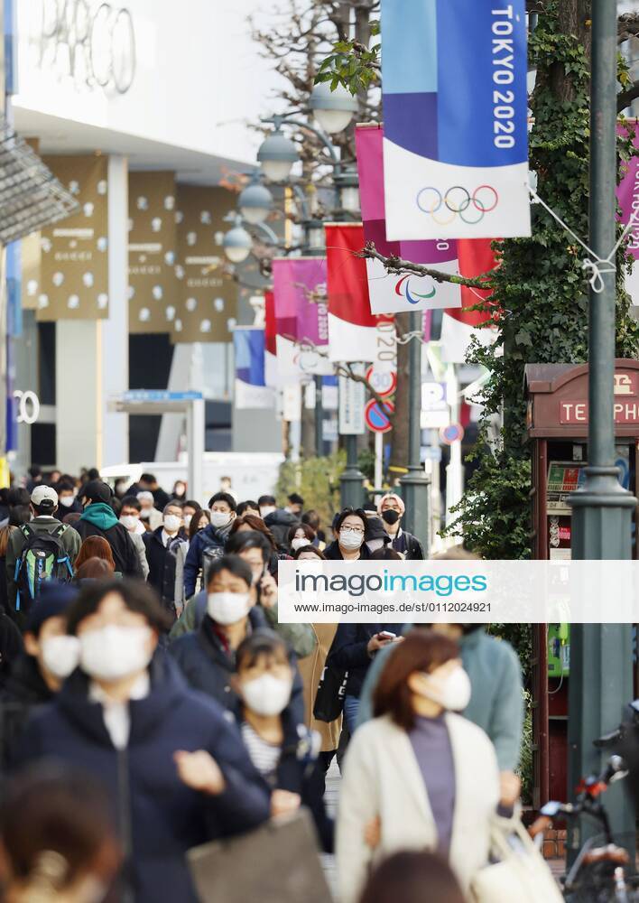 Coronavirus cases top 400,000 in Japan People wearing face masks to protect against the novel coronavirus walk in Tokyo s Shibuya area on Feb. 5, 2021. The cumulative number of coronavirus cases in Japan exceeded 400,000 the same day.