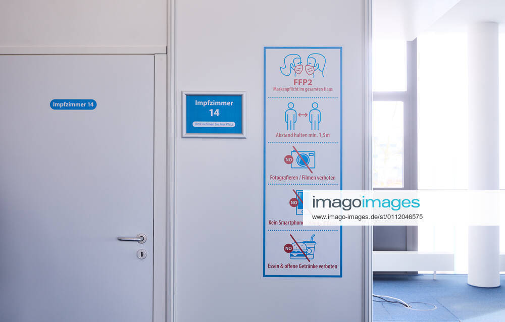 Signs in front of a vaccination room in the Bavarian Vaccination Center Augsburg, press tour Bavarian Vaccination Center Augsburg, press tour