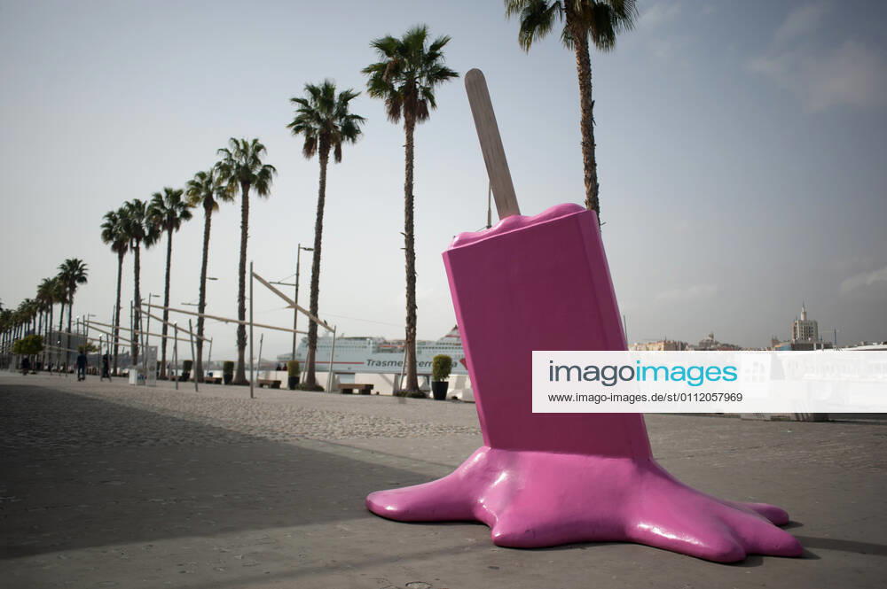 An installation with a figure of a melted ice cream is pictured on an empty street at a commercial area in Malaga..Many stores, shops and non-essential activities that closed due to the third wave of coronavirus pandemic show again empty situations in various places of Malaga city, at least until 15 February. Malaga Spain - ZUMAs197 20210205_zaa_s197_043