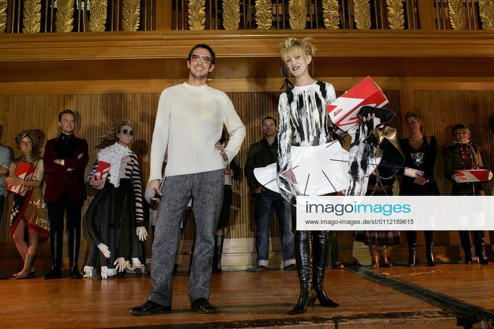 Sainte Catherine Copyright IMAGO HD 10 12 2005 Theme Jury member Oskar Roehler and Selma Berisalic Winner Special Prize from the category Western Europe Fashion School ESMOD celebrates Sainte Catherine 2005 with a charity event in favour of Afrikaherz in the former DDR Rundfunkgebaeude in Berlin