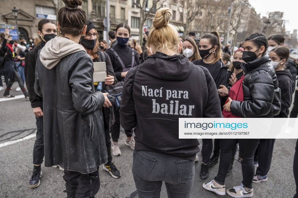 A protester wearing a sweatshirt written on I was born to dance takes part during the demonstration..Professionals, teachers and students of the Dance schools have gathered in Passeig de Grà cia to demand the suspension of the restrictive measures derived from the Covid infections to recover dance classes and return to work. Barcelona Spain - ZUMAs197 20210206_zaa_s197_139
