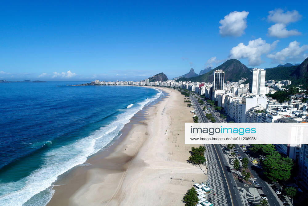 Brazil under COVID-19 RIO DE JANEIRO, BRAZIL, APR 20: COVID 19 - Drone view of Copacabana Beach empty due to pandemic lockdown on April 20, 2020. ( Photo by Chico Ferreira Penta Press ) Rio de Janeiro Brazil 5952_228646