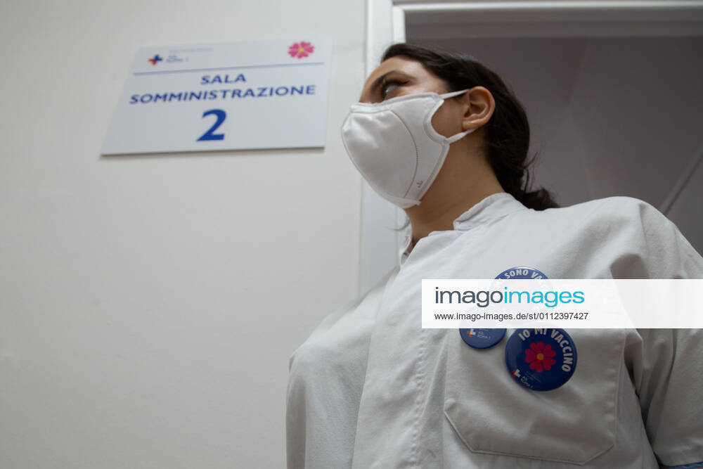 Italy: First COVID-19 vaccination for people over 80 in Rome Nurse with pins in favor of vaccination Rome Italy