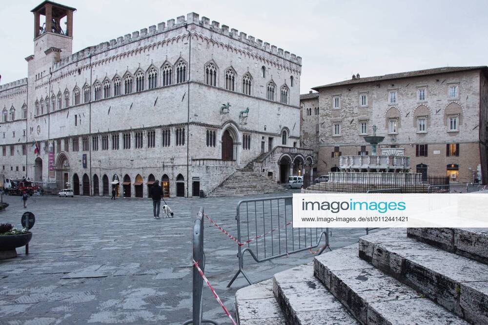 Perugia in the red zone. The capital and the province in full state of emergency covid 19 also due to the variants of the virus present in the area. the city is back in full lockdown. the deserted historic center. anguish and fear reign. 4th November Square Editorial Usage Only