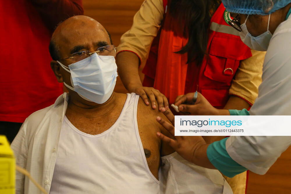 Bangladesh: Covid-19 vaccination drive begins in Dhaka A man getting a shot with the dose of Covishield covid-19 vaccine during the vaccination drive. Dhaka Dhaka Division Bangladesh