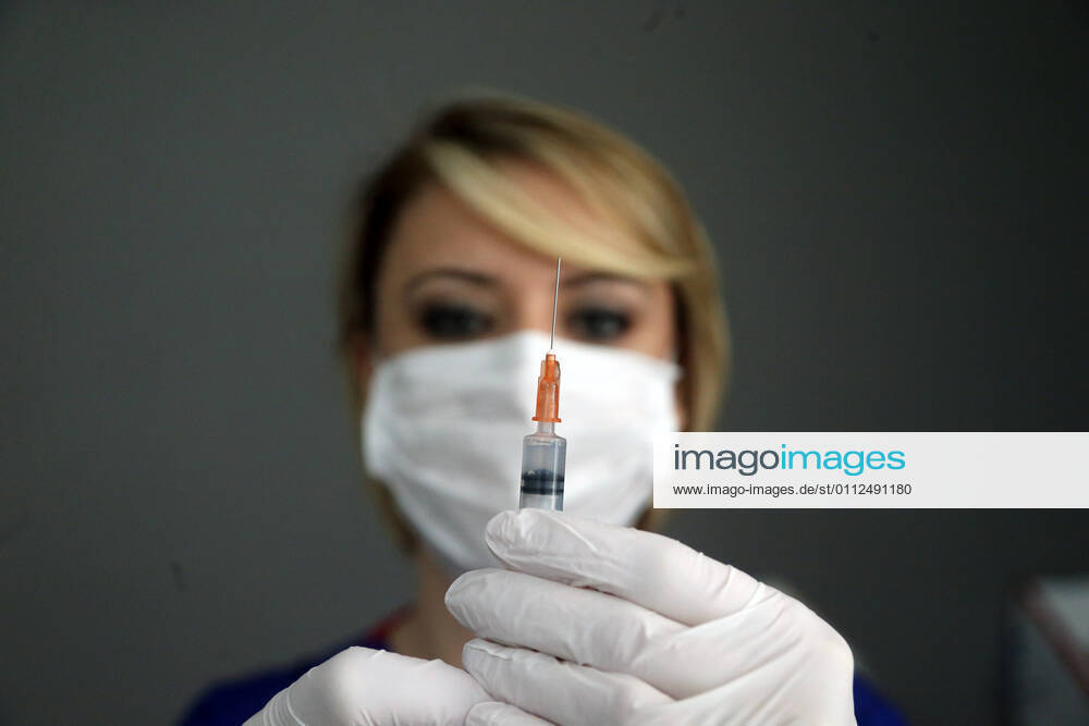 (210208) -- ANKARA, Feb. 8, 2021 -- A nurse prepares the COVID-19 vaccine at a health center in Ankara, Turkey, on Feb. 8, 2021. Turkey on Monday reported 8,103 new COVID-19 cases, including 632 symptomatic patients, as the total number of positive cases in the country reached 2,539,559, according to its health ministry. (Photo by Xinhua) TURKEY-ANKARA-COVID-19-VACCINATION MustafaxKaya