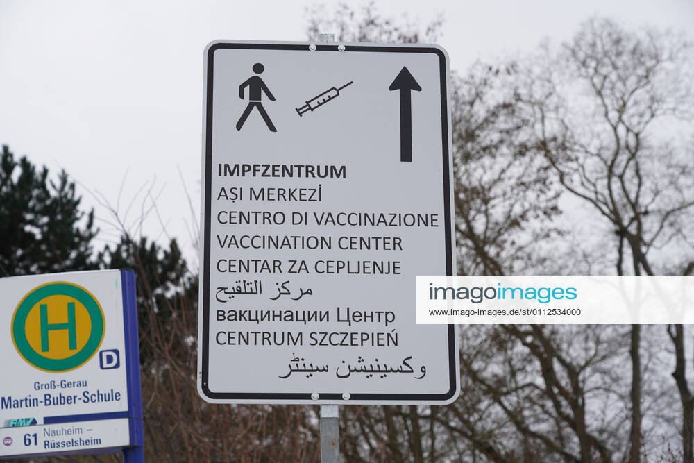 Signpost in several languages to the vaccination centre Gross Gerau 09 02 2021 Start of the vaccination centre Gross Gerau