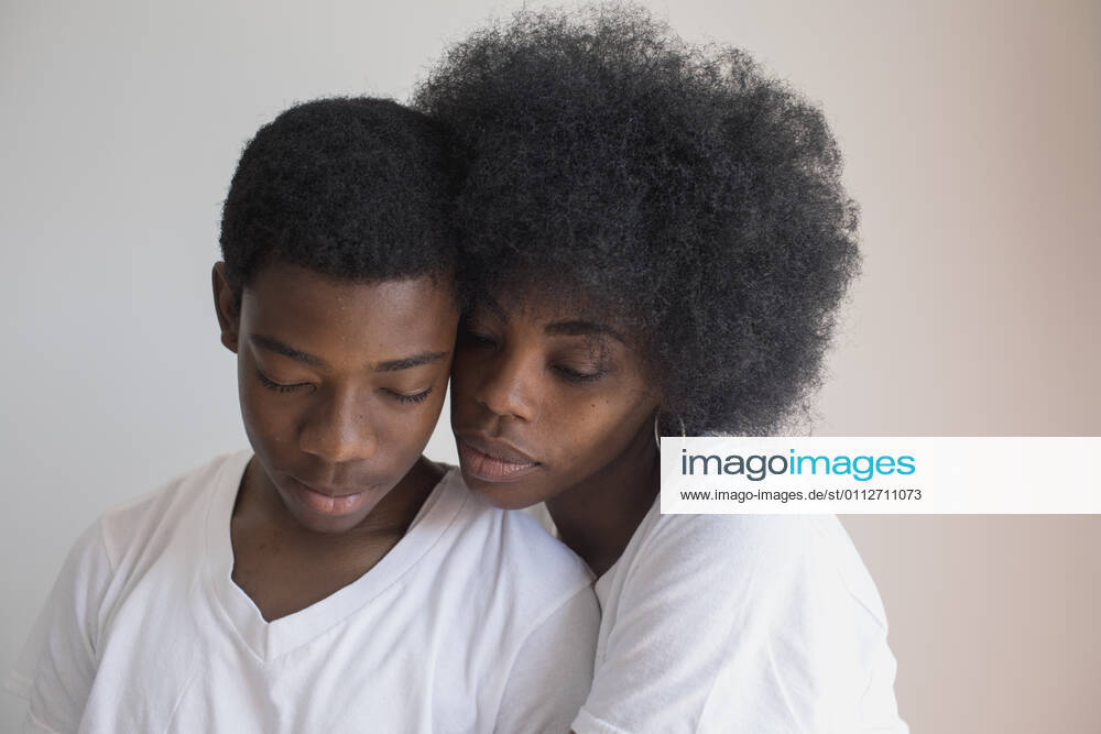 Portrait of a teenage boy and his mother model release HEX17010_TP__7675