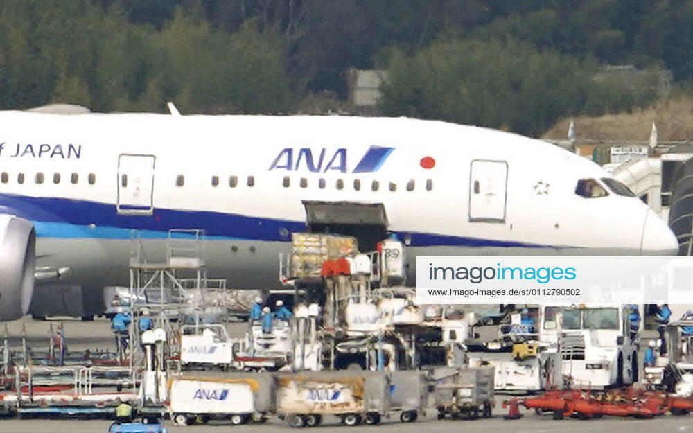 1st batch of Pfizer COVID-19 vaccine arrives in Japan Cargo is unloaded at Narita airport near Tokyo on Feb. 12, 2021, from an airplane that transported from Brussels the first batch to arrive in Japan of the coronavirus vaccine developed by U.S. pharmaceutical giant Pfizer Inc.