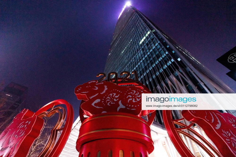 KW06 BEIJING, CHINA - FEBRUARY 11, 2021: Street decorations are pictured in Guomao Business District as China celebrates Chinese New Year 4719, the Year of the Ox. Artyom Ivanov TASS TS0F6915