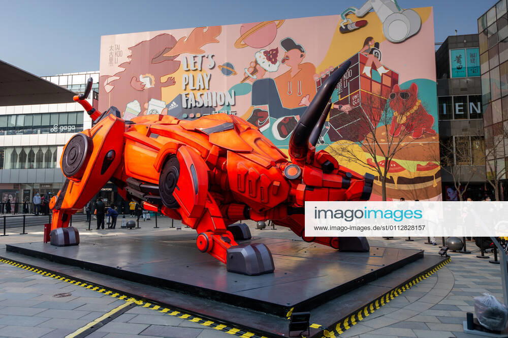 An ox installation is pictured outside a shopping center in Sanlitun, Beijing on Chinese New Year s Day. Artyom Ivanov TASS TS0F69E5