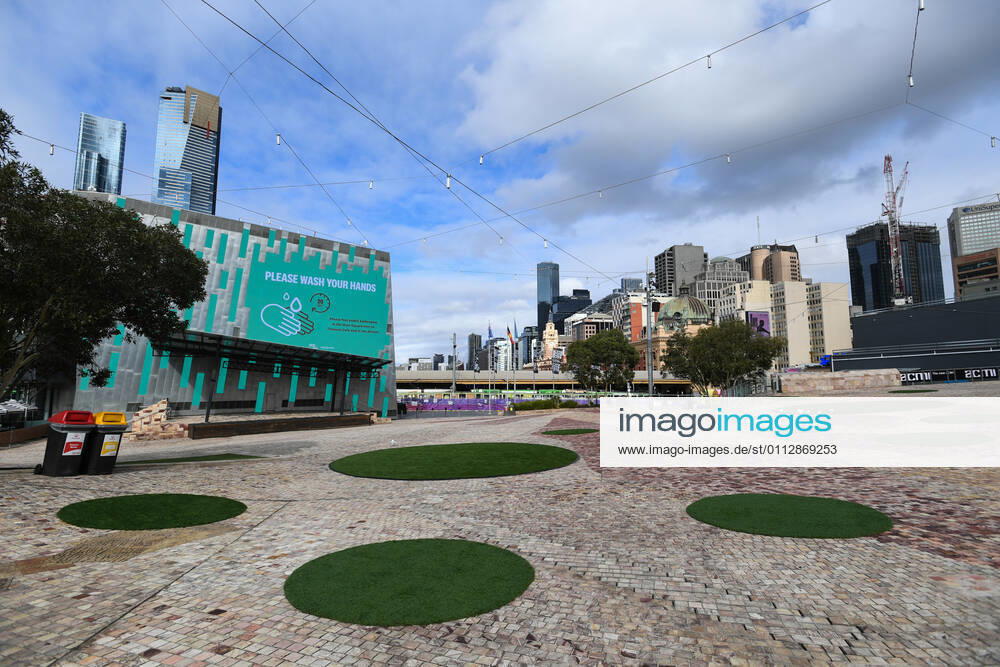 VICTORIA CORONAVIRUS COVID19, An empty Federation Square is seen in Melbourne, Saturday, February 13, 2021. Victoria has entered a short, sharp circuit-breaker lockdown for five days amid fears the highly infectious UK strain of coronavirus has spread in the community. ( NO ARCHIVING, , NO USE IN BOOKS WITHOUT CONSENT MELBOURNE VIC AUSTRALIA