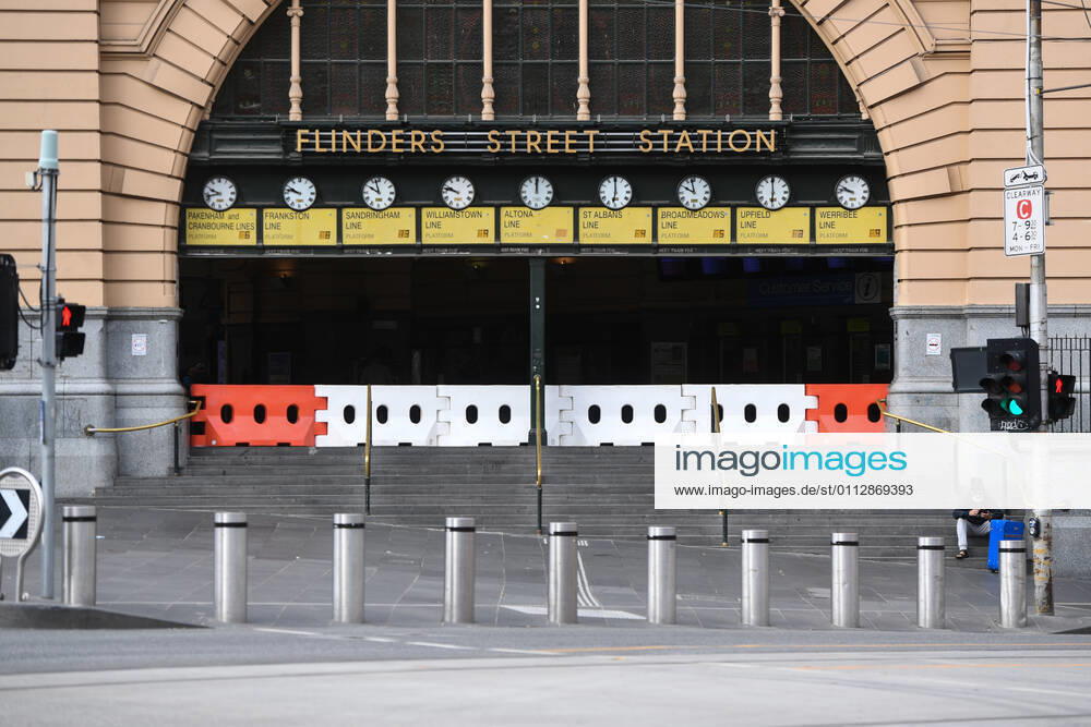 VICTORIA CORONAVIRUS COVID19, Flinders Street Station is seen in Melbourne, Saturday, February 13, 2021. Victoria has entered a short, sharp circuit-breaker lockdown for five days amid fears the highly infectious UK strain of coronavirus has spread in the community. ( NO ARCHIVING, , NO USE IN BOOKS WITHOUT CONSENT MELBOURNE VIC AUSTRALIA