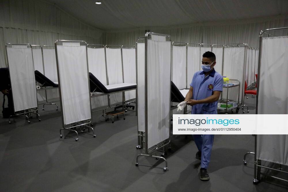 (210213) -- BEIRUT, Feb. 13, 2021 -- A worker is seen in a COVID-19 vaccination center at a hospital in Beirut, Lebanon, on Feb. 13, 2021. Lebanon received on Saturday the first batch of Pfizer-BioNTech vaccines with the vaccination campaign set to begin on Sunday. ) LEBANON-BEIRUT-COVID-19 VACCINES-PREPARATIONS BilalxJawich