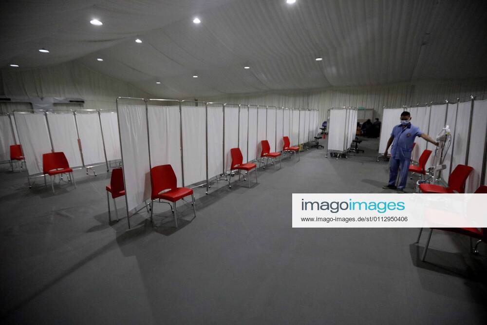 (210213) -- BEIRUT, Feb. 13, 2021 -- A worker is seen in a COVID-19 vaccination center at a hospital in Beirut, Lebanon, on Feb. 13, 2021. Lebanon received on Saturday the first batch of Pfizer-BioNTech vaccines with the vaccination campaign set to begin on Sunday. ) LEBANON-BEIRUT-COVID-19 VACCINES-PREPARATIONS BilalxJawich