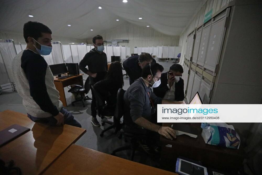 (210213) -- BEIRUT, Feb. 13, 2021 -- People make preparations at a COVID-19 vaccination center at a hospital in Beirut, Lebanon, on Feb. 13, 2021. Lebanon received on Saturday the first batch of Pfizer-BioNTech vaccines with the vaccination campaign set to begin on Sunday. ) LEBANON-BEIRUT-COVID-19 VACCINES-PREPARATIONS BilalxJawich