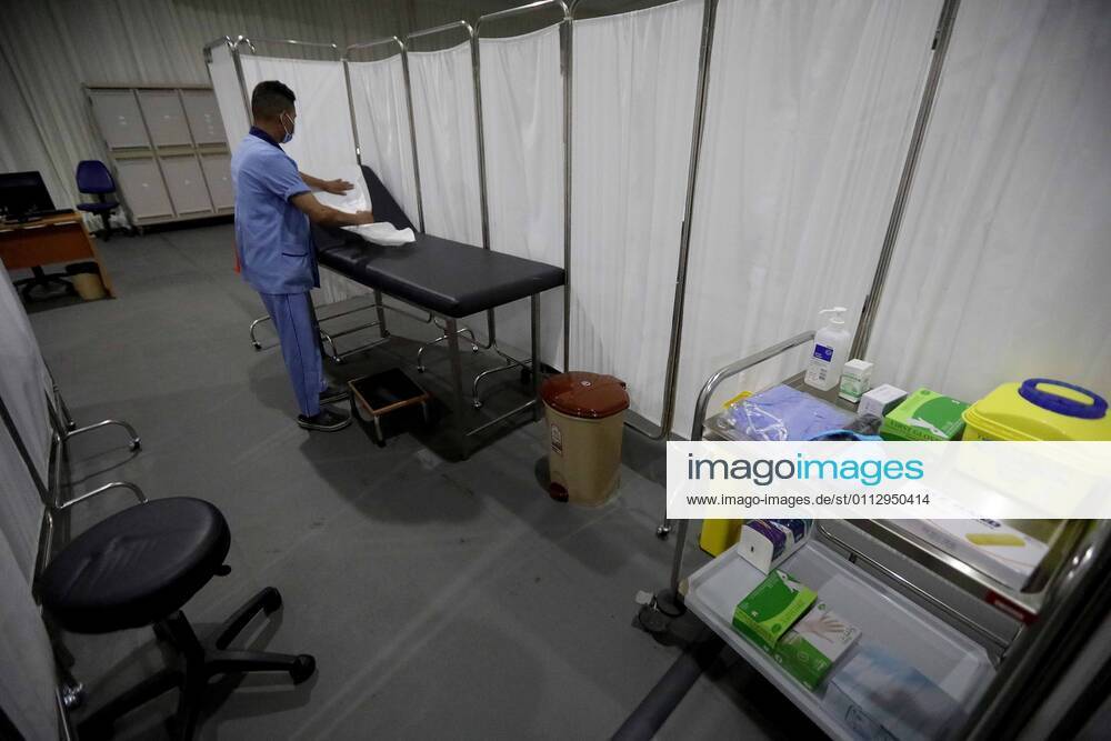 (210213) -- BEIRUT, Feb. 13, 2021 -- A worker is seen in a COVID-19 vaccination center at a hospital in Beirut, Lebanon, on Feb. 13, 2021. Lebanon received on Saturday the first batch of Pfizer-BioNTech vaccines with the vaccination campaign set to begin on Sunday. ) LEBANON-BEIRUT-COVID-19 VACCINES-PREPARATIONS BilalxJawich
