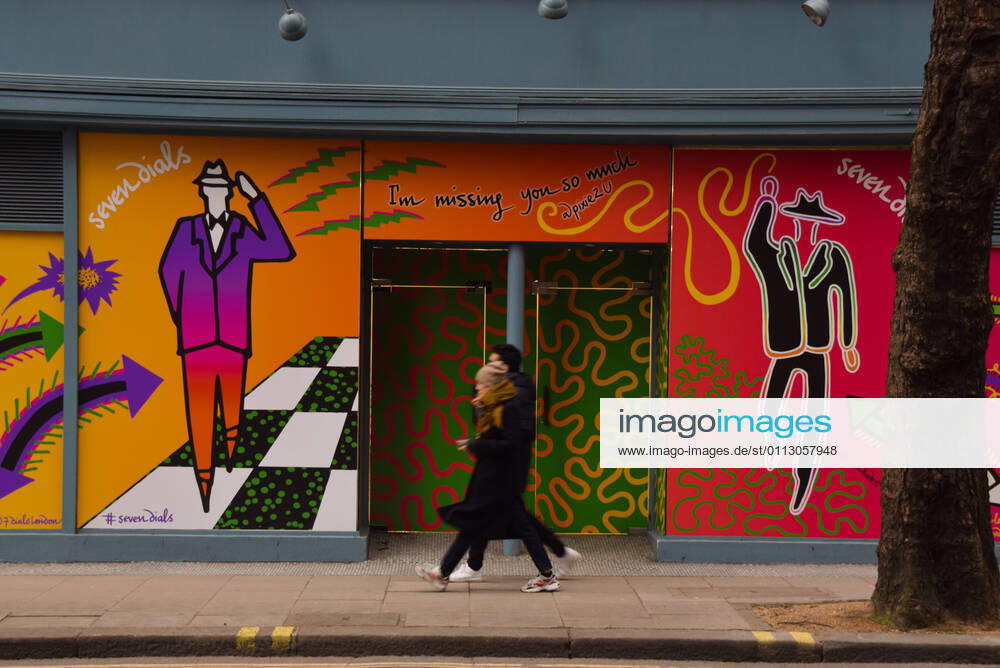 A couple walks past a permanently closed restaurant in the Seven Dials area of Central London..As most businesses remain closed in the capital, the government plans to begin easing the lockdown restrictions in the coming weeks. London United Kingdom - ZUMAs197 20210214_zaa_s197_307