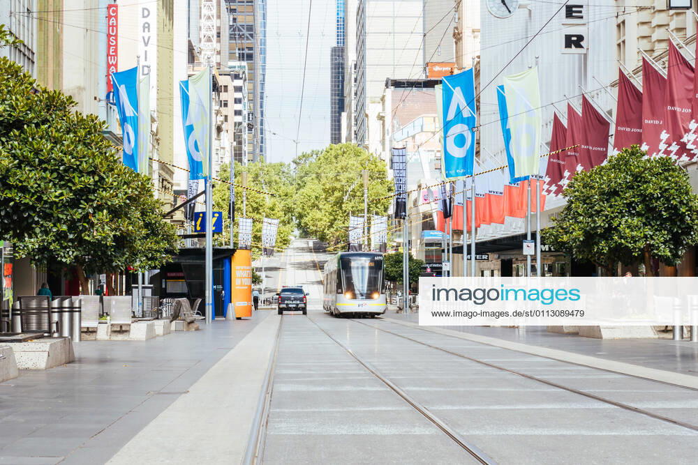 Melbourne, Australia - February 15 2021: Cafes and retail shops closed in Bourke St with police patrol at the start of a circuit breaker lockdown imposed suddenly by the Victorian Government. This is due to increasing numbers of COVID-19 cases in north western Melbourne. - ZUMAp121 20210215_zsp_p121_010