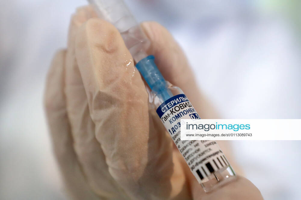 ST PETERSBURG, RUSSIA â€” FEBRUARY 15, 2021: A medical worker fills a syringe with Component 1 of the Gam-COVID-Vac vaccine (under the brand name of Sputnik V) while vaccinating people against COVID-19 at No 7 Neuropsychiatric Care Home. Alexander Demianchuk TASS TS0F6D18