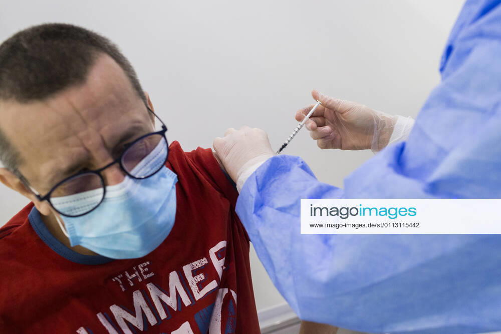 Man receives anti COVID-19 vaccine, produced by ASTRAZENECA, at a newly opened vaccination center in Timisoara. Timisoara Romania - ZUMAp180 20210215_zip_p180_006