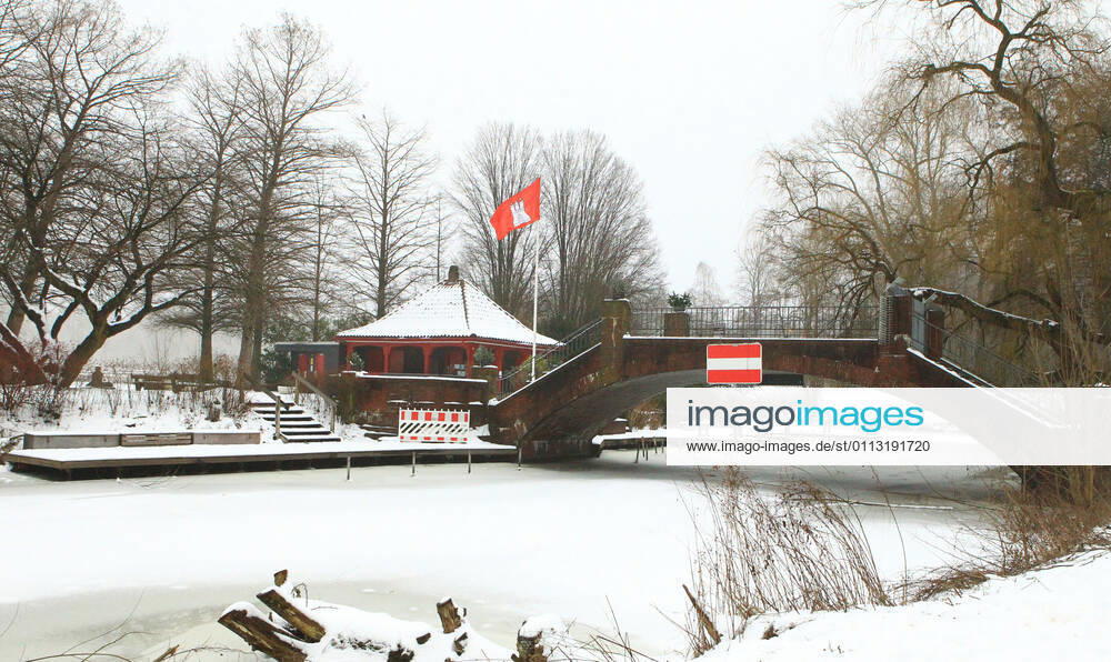 View of the snowy love island in the Hamburg city park Winterhude Hamburg