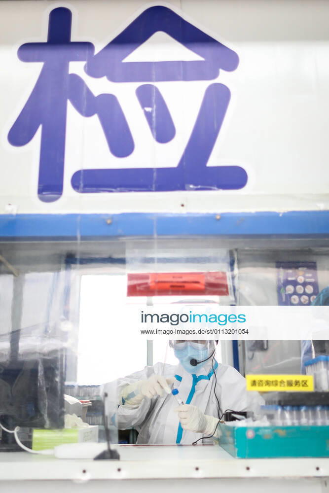 (210216) -- SHENYANG, Feb. 16, 2021 -- Sun Hewen, a medical worker with Shengjing Hospital of China Medical University, collects nucleic acid samples in Shenyang, capital of northeast China s Liaoning Province, Feb. 16, 2021. Since December last year, some areas in China s northeastern Heilongjiang, Jilin, and Liaoning Provinces reported newly confirmed COVID-19 cases. Related areas responded immediately according to epidemic prevention requirements. Mass nucleic acid testing were conducted in key areas in an effort to stem the spread of the coronavirus. Recently, no new confirmed COVID-19 cases have been reported here for several days. During the Spring Festival vacation, many workers stick to their posts to make sure we can celebrate the