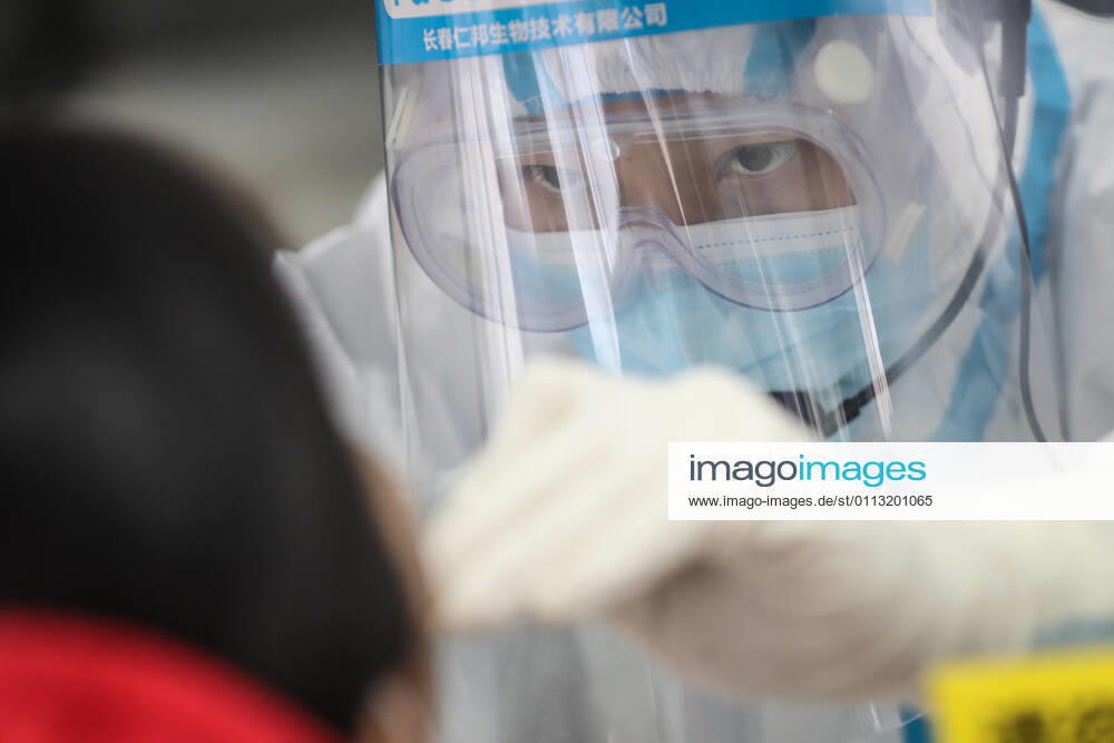 (210216) -- SHENYANG, Feb. 16, 2021 -- Sun Hewen, a medical worker with Shengjing Hospital of China Medical University, collects nucleic acid samples in Shenyang, capital of northeast China s Liaoning Province, Feb. 16, 2021. Since December last year, some areas in China s northeastern Heilongjiang, Jilin, and Liaoning Provinces reported newly confirmed COVID-19 cases. Related areas responded immediately according to epidemic prevention requirements. Mass nucleic acid testing were conducted in key areas in an effort to stem the spread of the coronavirus. Recently, no new confirmed COVID-19 cases have been reported here for several days. During the Spring Festival vacation, many workers stick to their posts to make sure we can celebrate the