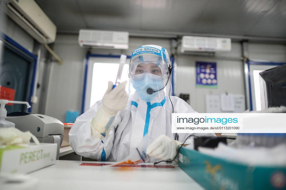 (210216) -- SHENYANG, Feb. 16, 2021 -- Sun Hewen, a medical worker with Shengjing Hospital of China Medical University, collects nucleic acid samples in Shenyang, capital of northeast China s Liaoning Province, Feb. 16, 2021. Since December last year, some areas in China s northeastern Heilongjiang, Jilin, and Liaoning Provinces reported newly confirmed COVID-19 cases. Related areas responded immediately according to epidemic prevention requirements. Mass nucleic acid testing were conducted in key areas in an effort to stem the spread of the coronavirus. Recently, no new confirmed COVID-19 cases have been reported here for several days. During the Spring Festival vacation, many workers stick to their posts to make sure we can celebrate the