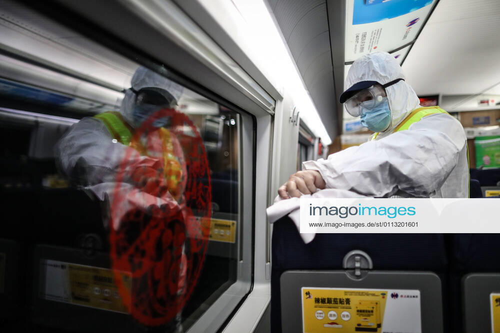 (210216) -- SHENYANG, Feb. 16, 2021 -- Wang Tong, a mechanic of China Railway Shenyang Bureau, disinfects a train in Shenyang, capital of northeast China s Liaoning Province, Feb. 14, 2021. Since December last year, some areas in China s northeastern Heilongjiang, Jilin, and Liaoning Provinces reported newly confirmed COVID-19 cases. Related areas responded immediately according to epidemic prevention requirements. Mass nucleic acid testing were conducted in key areas in an effort to stem the spread of the coronavirus. Recently, no new confirmed COVID-19 cases have been reported here for several days. During the Spring Festival vacation, many workers stick to their posts to make sure people can celebrate the festival safely. ) CHINA-SPRING