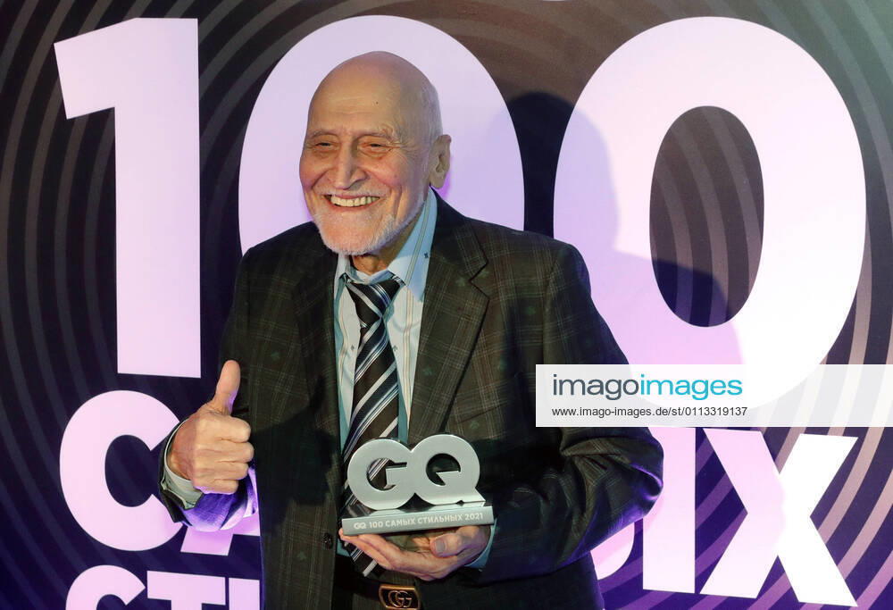 TV host Nikolai Drozdov holds his prize at a cocktail party marking the release of the annual GQ 100 Most Stylish Men rating, at the Magadan restaurant. Mikhail Japaridze TASS TS0F7142