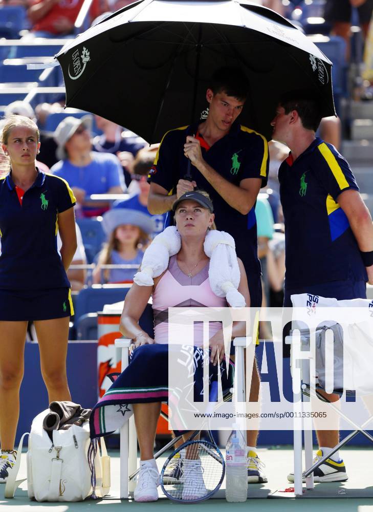 Maria Sharapova of Russia ices her neck during a change over in her match against Mallory Burdette in Arthur Ashe Stadium at the Billie Jean King National Tennis Center in New York City on August 31, 2012. Sharapova defeated Burdette 6-1, 6-1. NYP20120831142