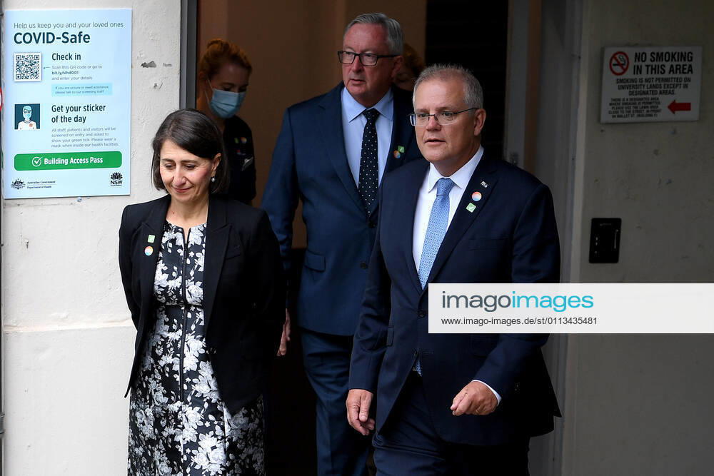 SCOTT MORRISON VACCINE HOSPITAL TOUR, Prime Minister Scott Morrison with NSW Premier Gladys Berejiklian and NSW Health Minister Brad Hazzard (centre) arrive to address media following a tour of a COVID-19 vaccination hub at Royal Prince Alfred hospital in Sydney, Friday, February 19, 2021. The first COVID-19 vaccinations in NSW will take place on Monday, with the Pfizer jab to go out to frontline workers. ( NO ARCHIVING, , NO USE IN BOOKS WITHOUT CONSENT Sydney NSW AUSTRALIA