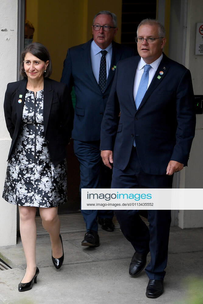 SCOTT MORRISON VACCINE HOSPITAL TOUR, Prime Minister Scott Morrison with NSW Premier Gladys Berejiklian and NSW Health Minister Brad Hazzard (centre) arrive to address media following a tour of a COVID-19 vaccination hub at Royal Prince Alfred hospital in Sydney, Friday, February 19, 2021. The first COVID-19 vaccinations in NSW will take place on Monday, with the Pfizer jab to go out to frontline workers. ( NO ARCHIVING, , NO USE IN BOOKS WITHOUT CONSENT Sydney NSW AUSTRALIA