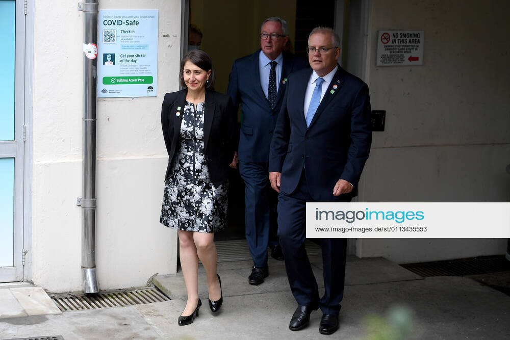 SCOTT MORRISON VACCINE HOSPITAL TOUR, Prime Minister Scott Morrison with NSW Premier Gladys Berejiklian and NSW Health Minister Brad Hazzard (centre) arrive to address media following a tour of a COVID-19 vaccination hub at Royal Prince Alfred hospital in Sydney, Friday, February 19, 2021. The first COVID-19 vaccinations in NSW will take place on Monday, with the Pfizer jab to go out to frontline workers. ( NO ARCHIVING, , NO USE IN BOOKS WITHOUT CONSENT Sydney NSW AUSTRALIA