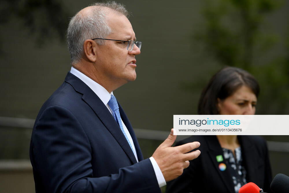 SCOTT MORRISON VACCINE HOSPITAL TOUR, Prime Minister Scott Morrison and NSW Premier Gladys Berejiklian address media following a tour of a COVID-19 vaccination hub at Royal Prince Alfred hospital in Sydney, Friday, February 19, 2021. The first COVID-19 vaccinations in NSW will take place on Monday, with the Pfizer jab to go out to frontline workers. ( NO ARCHIVING, , NO USE IN BOOKS WITHOUT CONSENT Sydney NSW AUSTRALIA