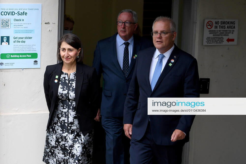 SCOTT MORRISON VACCINE HOSPITAL TOUR, Prime Minister Scott Morrison with NSW Premier Gladys Berejiklian and NSW Health Minister Brad Hazzard (centre) arrive to address media following a tour of a COVID-19 vaccination hub at Royal Prince Alfred hospital in Sydney, Friday, February 19, 2021. The first COVID-19 vaccinations in NSW will take place on Monday, with the Pfizer jab to go out to frontline workers. ( NO ARCHIVING, , NO USE IN BOOKS WITHOUT CONSENT Sydney NSW AUSTRALIA
